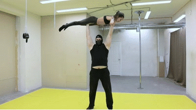 Tiffany is being held captive by a backbreaker Tiffany is being held captive by a backbreaker